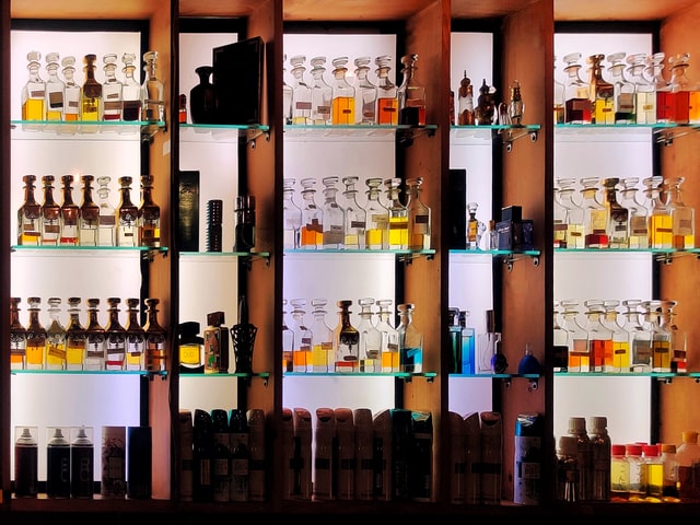A portrait of  different scent bottles stored in a shop