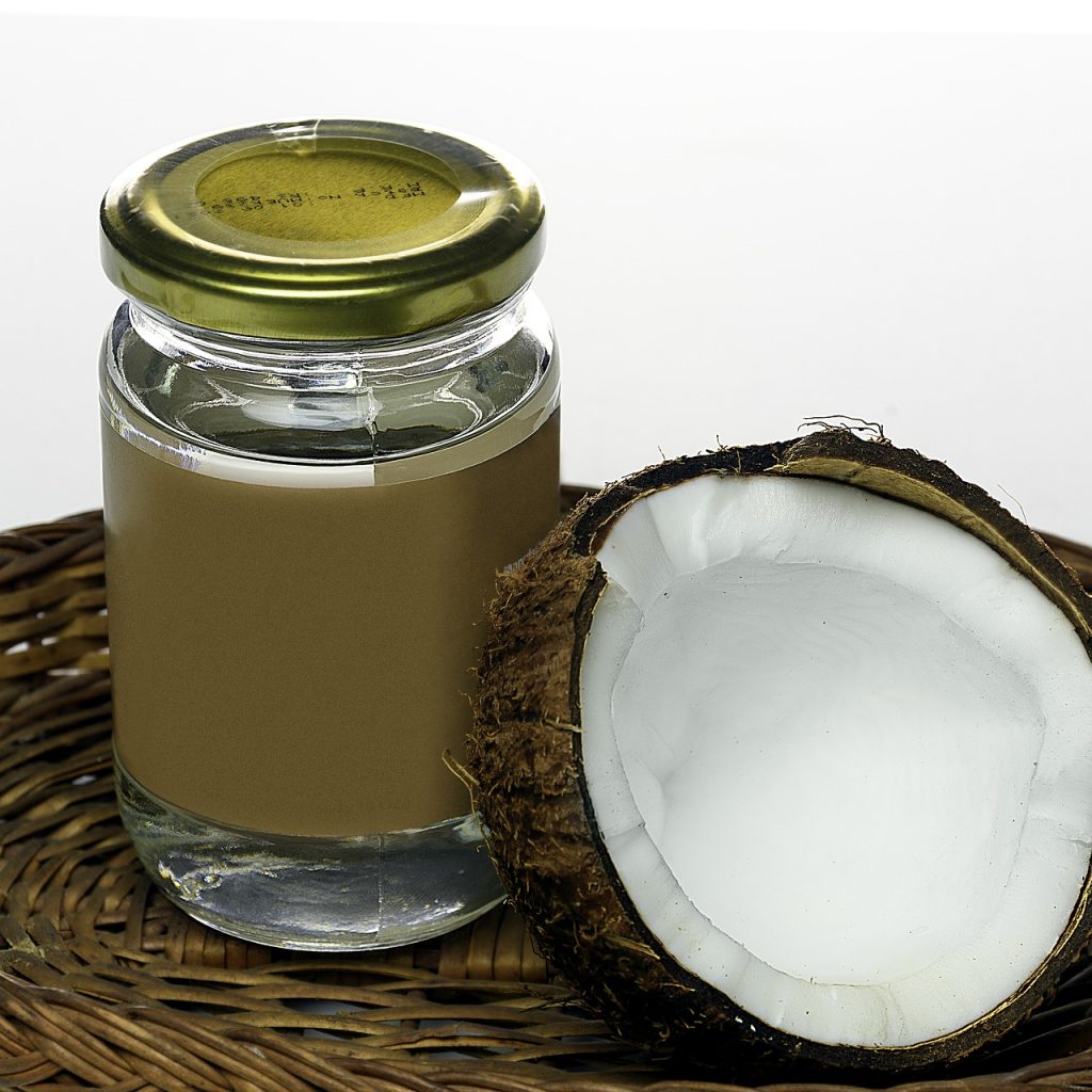 An image of coconut oil with coconut as advertising concept