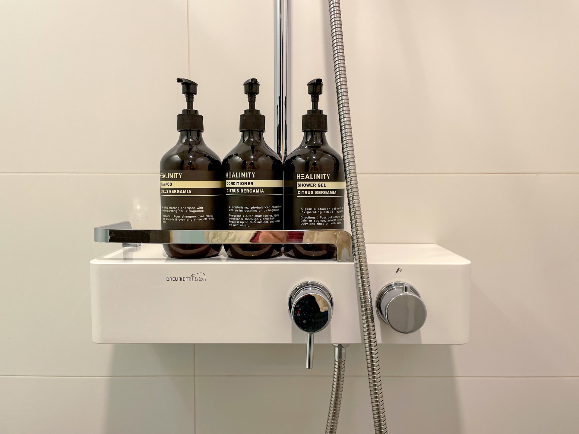 An image of men's hair care products in washroom